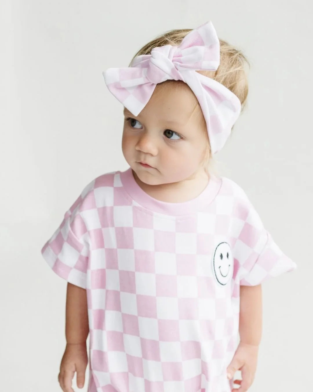Shirt Sleeve Bubble Romper-Checkered Smiley Pink