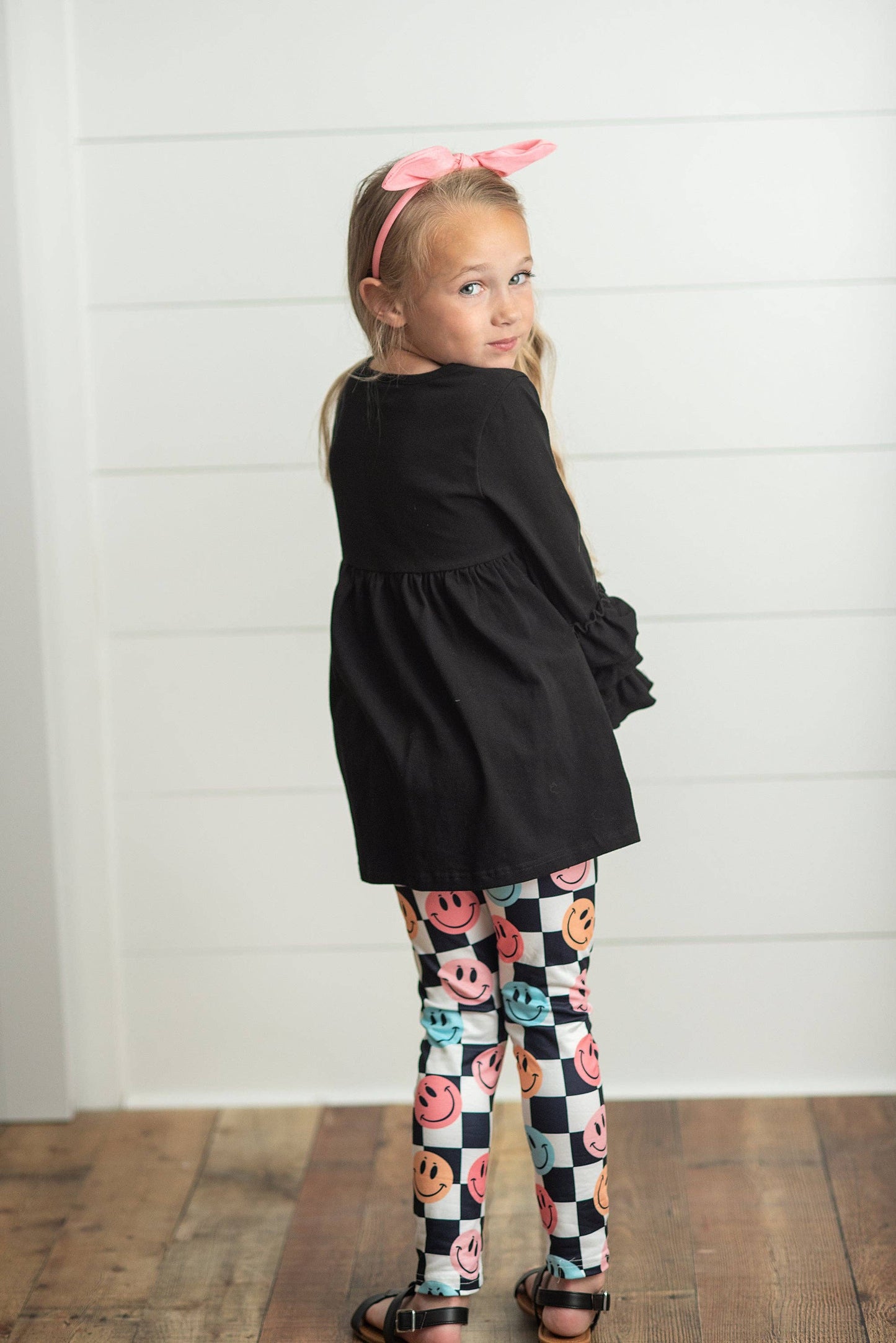 Kids Black & White Check Smiley Face Ruffle Top Leggings Set